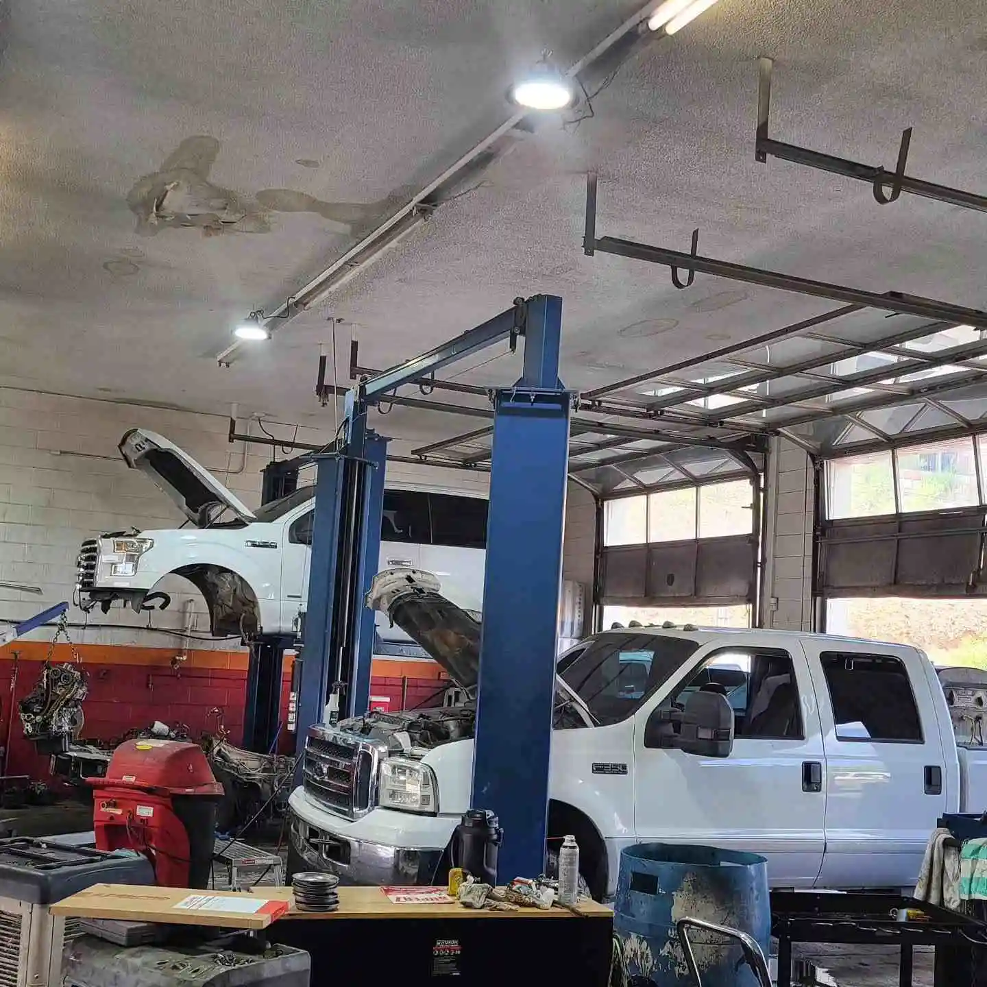 Mechanic working under a vehicle